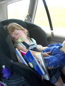 Sarah napping in car.